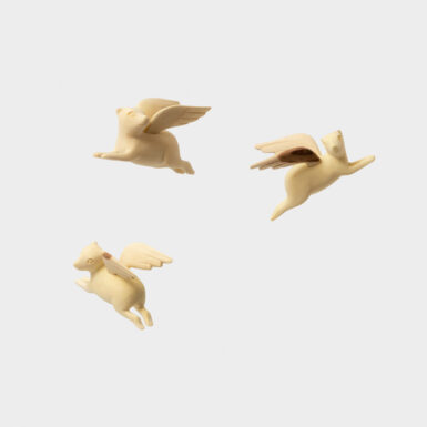 A Carved Wooden Winged Dassie